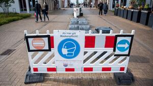 Ein Schild mit der Aufschrift "Ab hier gilt Maskenpflicht"