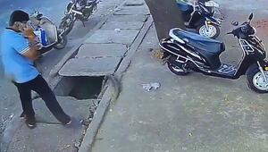 Mann vermeidet beim Telefonieren Loch im Gehsteig – und hat trotzdem Pech