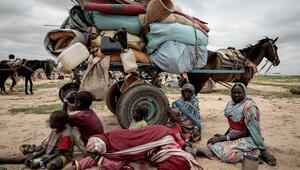 Sudanesische Familie auf der Flucht