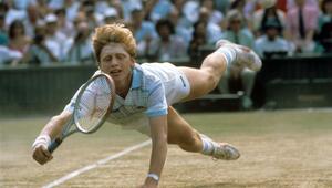 Der deutsche Tennisspieler Boris Becker hechtet während des Turniers in Wimbledon