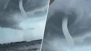 Szene wie aus einem Katastrophenfilm: Familie flieht vor Wasserhose