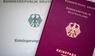 Einbürgerungsurkunde und Reisepass