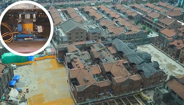 Roboterarmee bewegt kompletten Gebäudekomplex in Shanghai