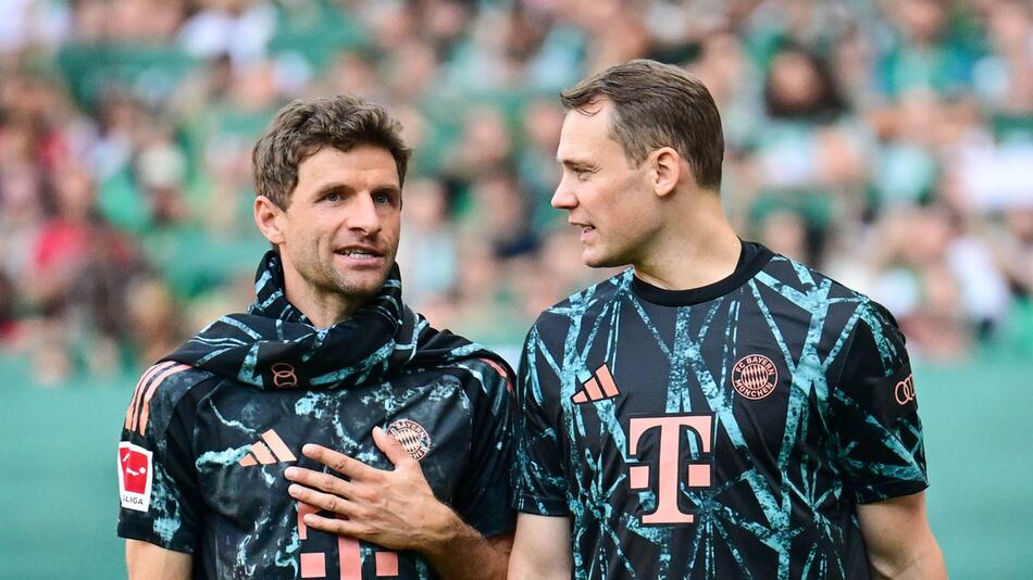 Thomas Müller (l) und Manuel Neuer