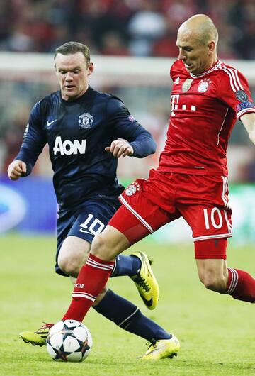 Arjen Robben verteidigt den Ball gegen Wayne Rooney.