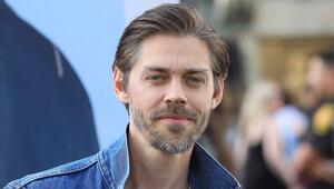 Tom Payne fühlt sich in den USA nicht mehr wohl.