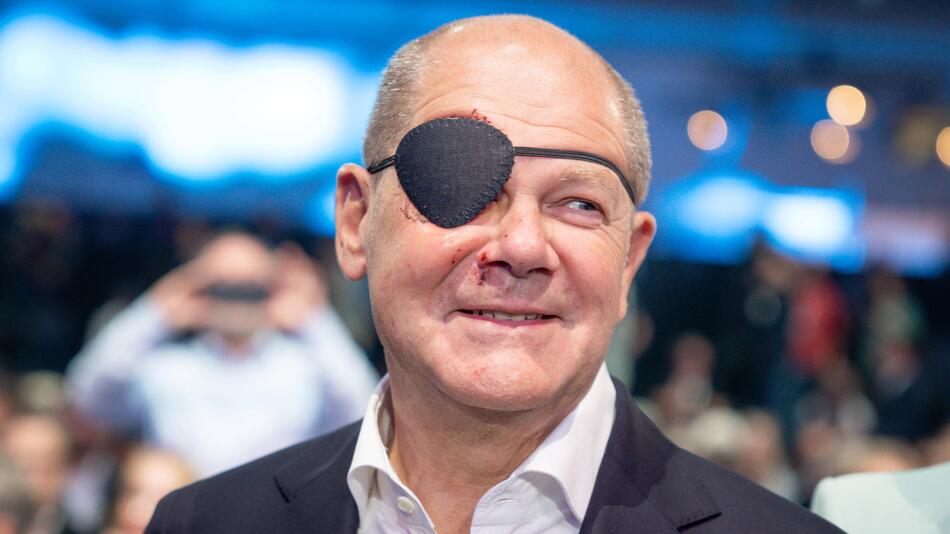 Bundeskanzler Olaf Scholz mit Augenklappe