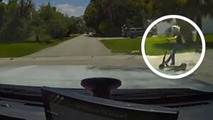 Dashcam: Teenager auf E-Scooter überfährt Stoppschild und kracht in Streifenwagen