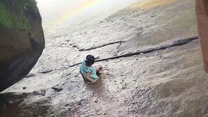 Dramatische Momente am Wasserfall: Kind verliert Halt – Vater greift ein