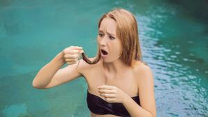 Pool- und Meerwasser trocknet die Haare aus. Mit einer vorbereitenden Pflege kann Schäden ...