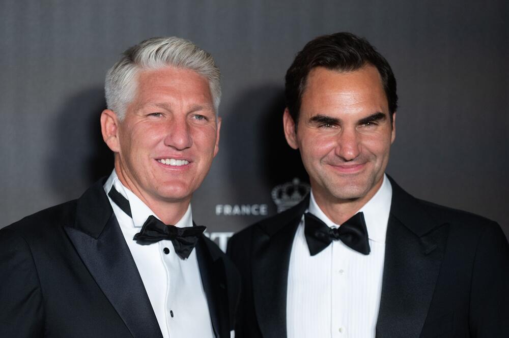 Bastian Schweinsteiger und Roger Federer