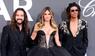 Tom Kaulitz (l.), Heidi Klum und Henry Samuel auf der amfAR-Gala in Cannes im Mai 2026.