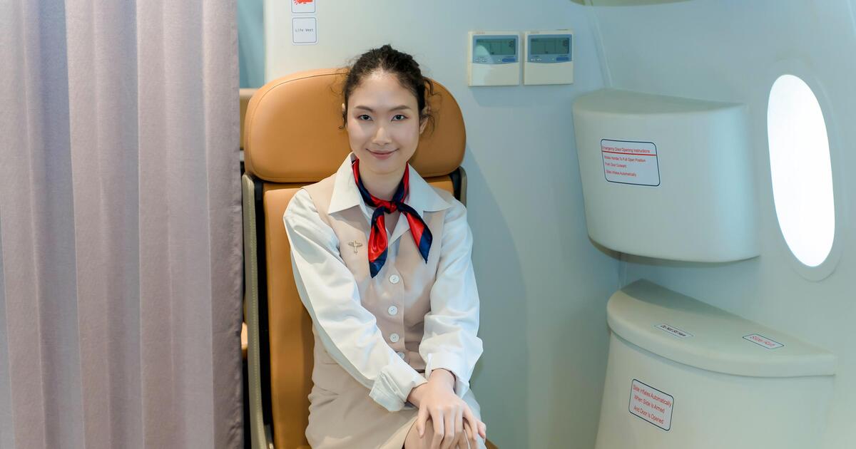 Why Flight Attendants Sit on Their Hands During Takeoff and Landing