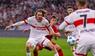 Nick Woltemade und Joshua Kimmich kämpfen um den Ball.