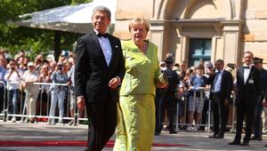 Joachim Sauer und Angela Merkel