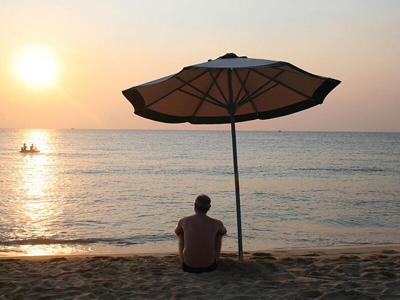 Mann am Strand