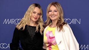 Frauke Ludowig mit ihrer Tochter Nele auf einem Event.