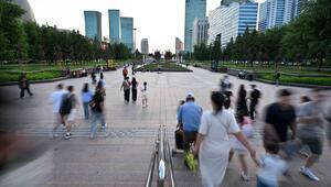 250615 -- ASTANA, June 15, 2025 -- People walk in downtown Astana, Kazakhstan, June 11, 2025.
