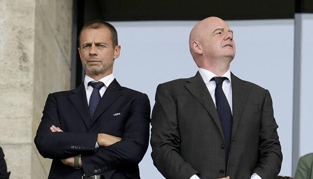Uefa-Boss Ceferin (li.) und Fifa-Boss Infantino.