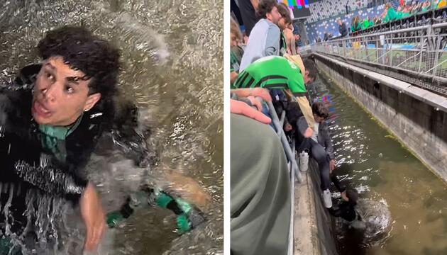 Fußballfan will aufs Spielfeld – und landet im Stadiongraben